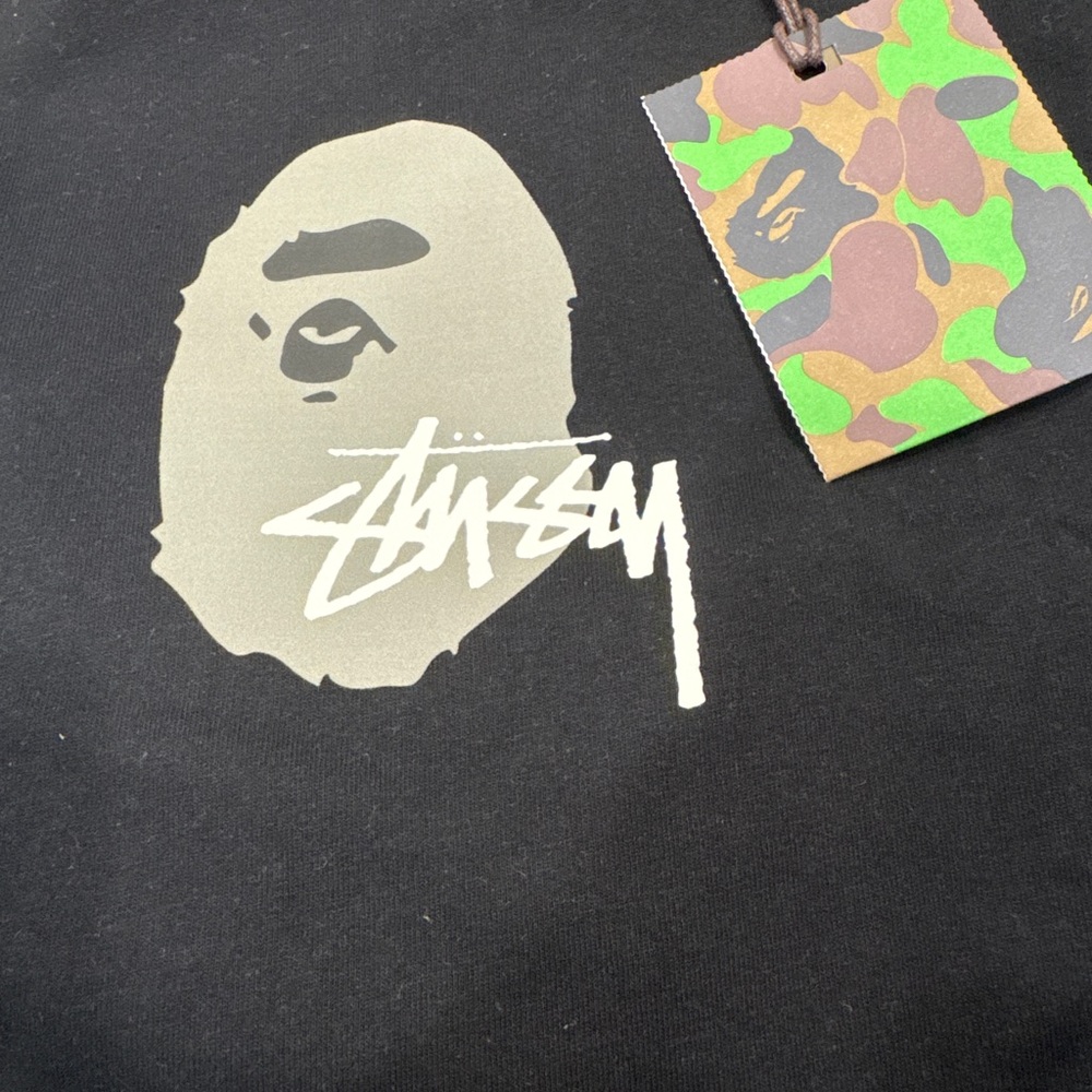 Stussy Black Tee with Cream Graphic